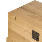 Inspired by classic Chinese antiques, this heritage-style trunk blends timeless design with modern functionality. Crafted from oak with a light, toasted finish, bronzed latch-and-key hardware adds a playful design detail Amethyst Home provides interior design, new home construction design consulting, vintage area rugs, and lighting in the Houston metro area.