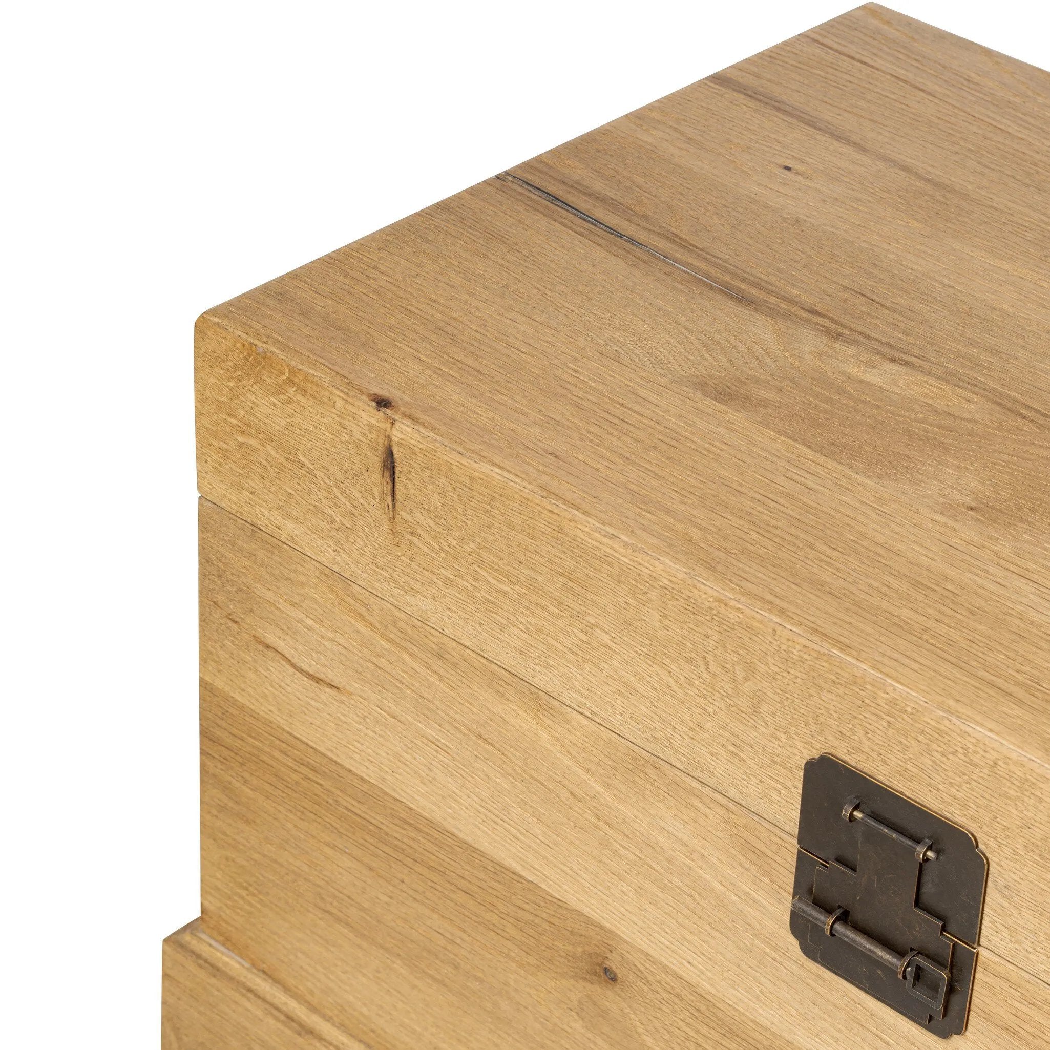 Inspired by classic Chinese antiques, this heritage-style trunk blends timeless design with modern functionality. Crafted from oak with a light, toasted finish, bronzed latch-and-key hardware adds a playful design detail Amethyst Home provides interior design, new home construction design consulting, vintage area rugs, and lighting in the Houston metro area.