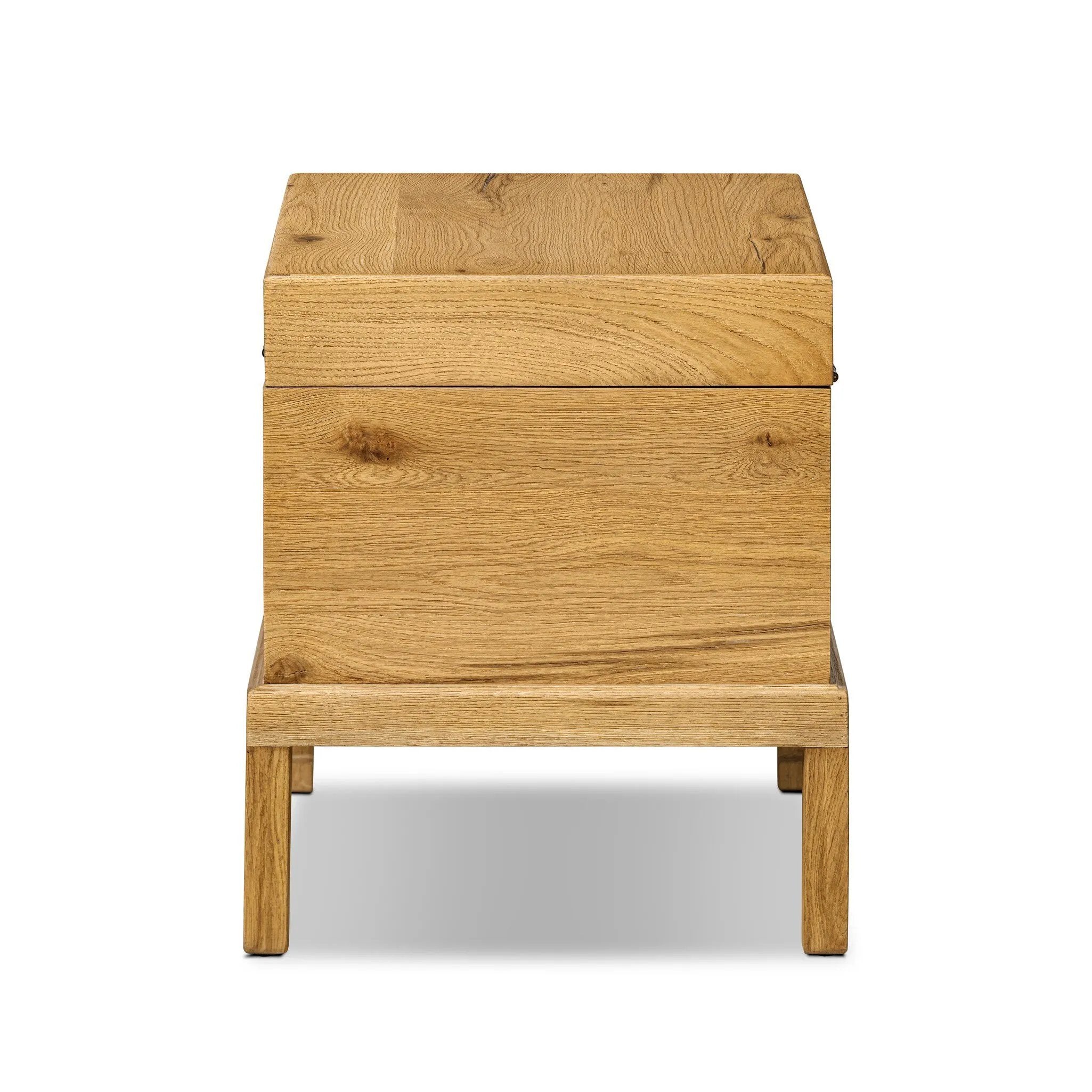 Inspired by classic Chinese antiques, this heritage-style trunk blends timeless design with modern functionality. Crafted from oak with a light, toasted finish, bronzed latch-and-key hardware adds a playful design detail Amethyst Home provides interior design, new home construction design consulting, vintage area rugs, and lighting in the San Diego metro area.