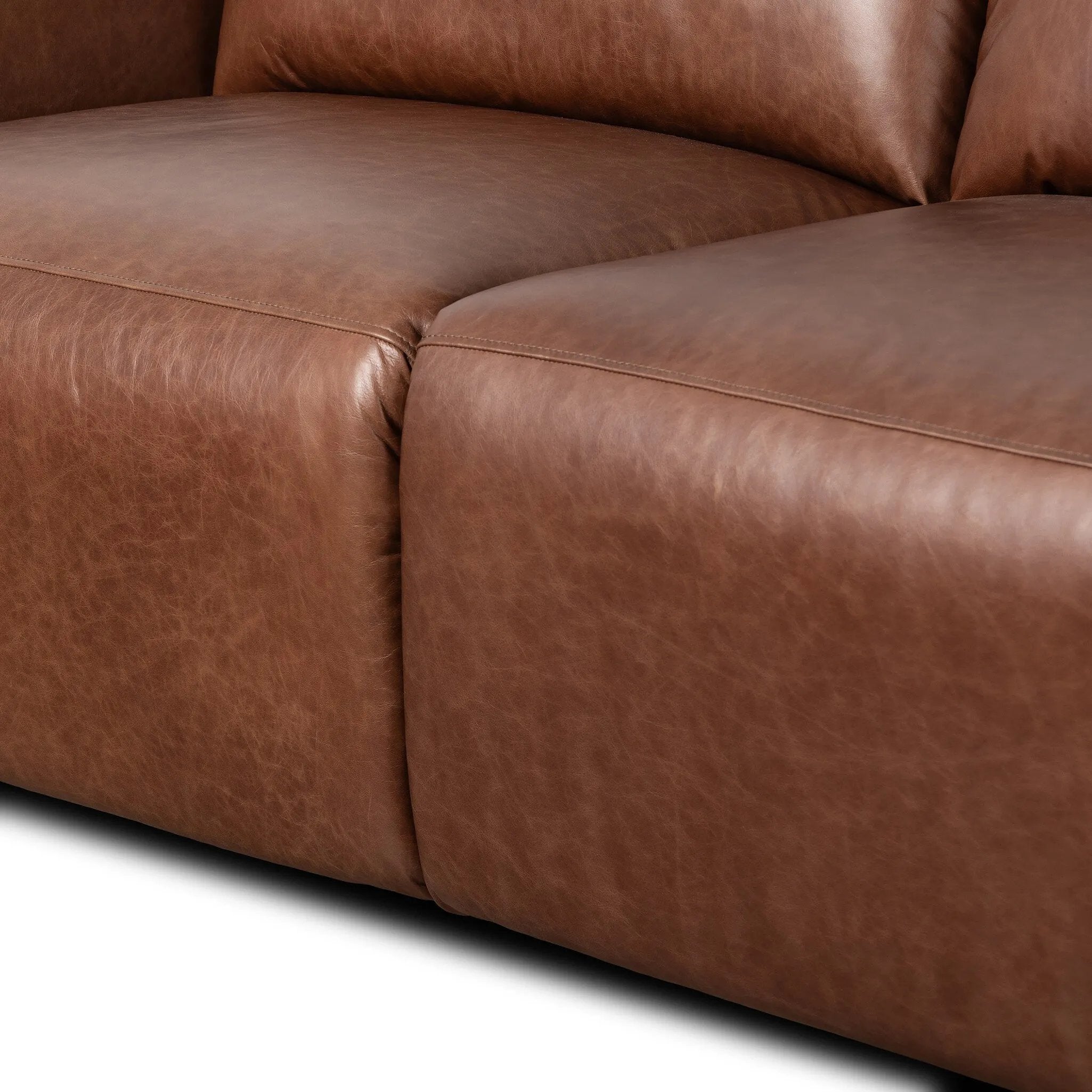 Introducing an Italian-inspired modern sectional with a suite of seating that reclines. Each seat has its very own reclining mechanism so that everyone can sit back and relax. Sectional features waterfall seating, curved arms, adjustable headrests, articulating footrests and rounded back corners. The concealed power motion adjusts comfort level. Amethyst Home provides interior design, new home construction design consulting, vintage area rugs, and lighting in the Newport Beach metro area.