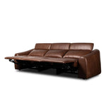 Introducing an Italian-inspired modern sectional with a suite of seating that reclines. Each seat has its very own reclining mechanism so that everyone can sit back and relax. Sectional features waterfall seating, curved arms, adjustable headrests, articulating footrests and rounded back corners. The concealed power motion adjusts comfort level. Amethyst Home provides interior design, new home construction design consulting, vintage area rugs, and lighting in the Newport Beach metro area.