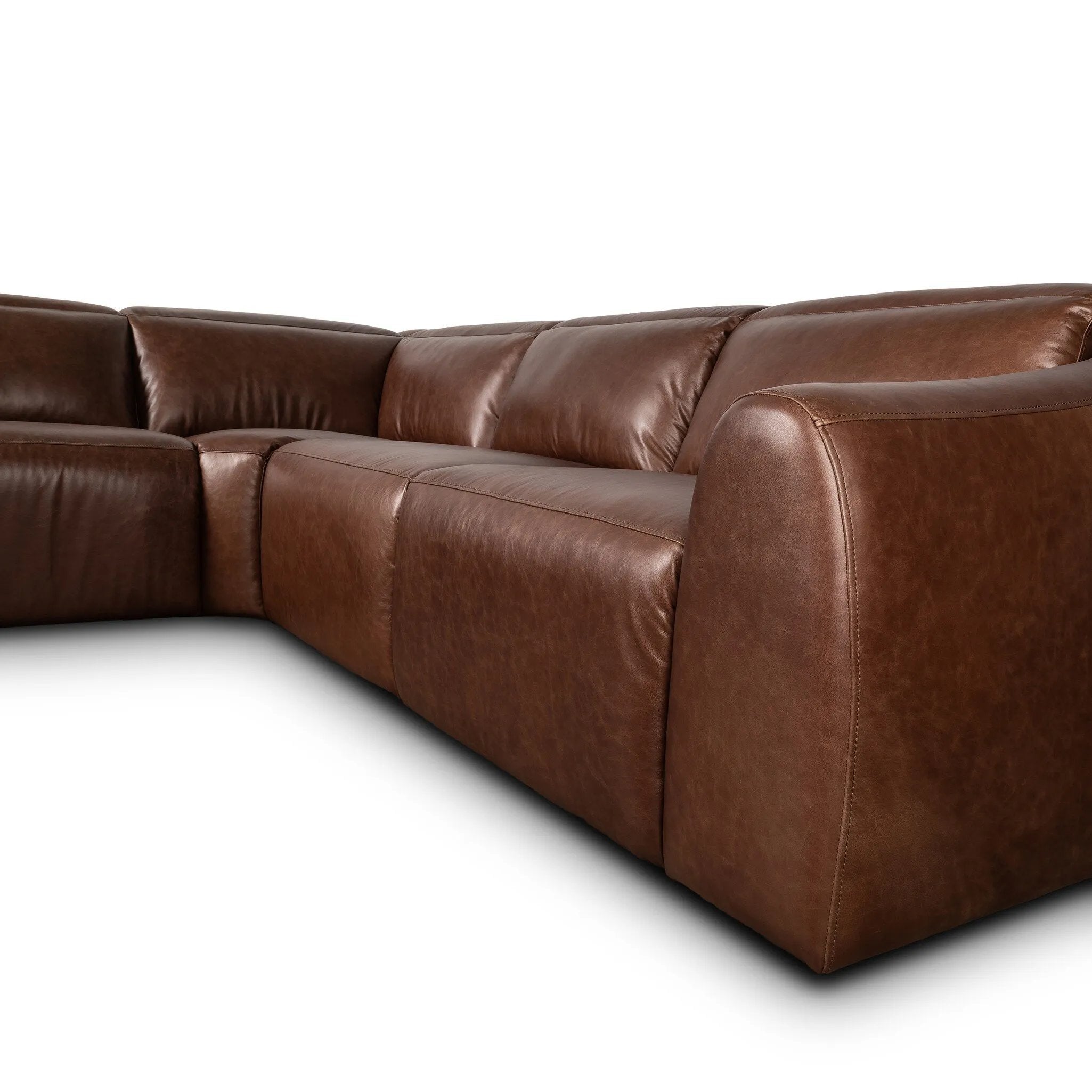 Introducing an Italian-inspired modern sectional with a suite of seating that reclines. Just about every seat on the sofa has its very own reclining mechanism so that everyone can sit back and relax. Sectional features waterfall seating, curved arms, adjustable headrests, articulating footrests and rounded back corners. Amethyst Home provides interior design, new home construction design consulting, vintage area rugs, and lighting in the Calabasas metro area.