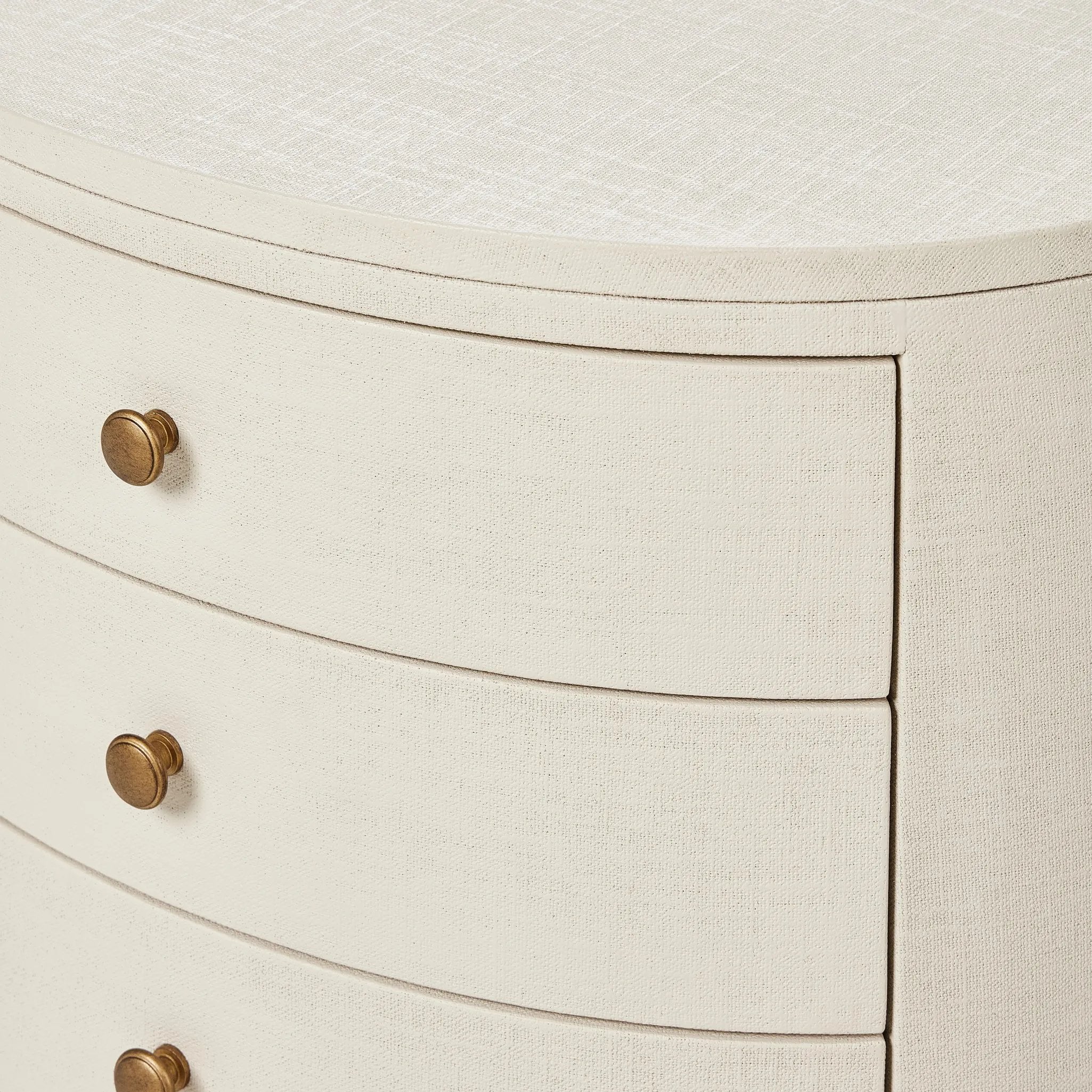 Uniquely made from ivory-painted linen, a beautifully curved nightstand shapes four drawers for generous bedside storage Amethyst Home provides interior design, new home construction design consulting, vintage area rugs, and lighting in the Calabasas metro area.