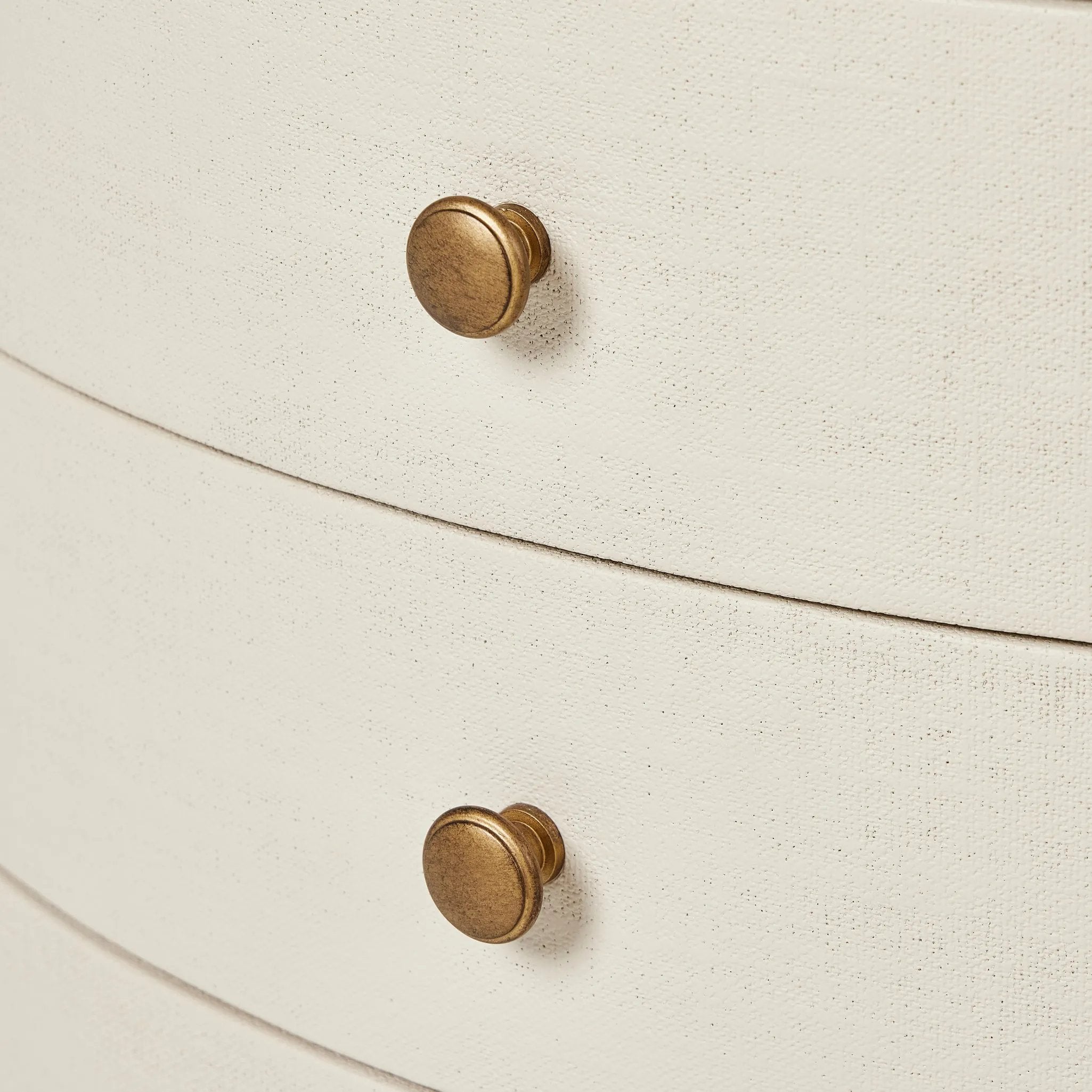 Uniquely made from ivory-painted linen, a beautifully curved nightstand shapes four drawers for generous bedside storage Amethyst Home provides interior design, new home construction design consulting, vintage area rugs, and lighting in the Los Angeles metro area.