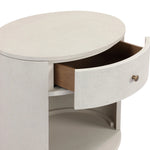 Uniquely made from ivory-painted linen, a beautifully curved nightstand shapes a single drawer and an open cubby for generous bedside storage Amethyst Home provides interior design, new home construction design consulting, vintage area rugs, and lighting in the Calabasas metro area.