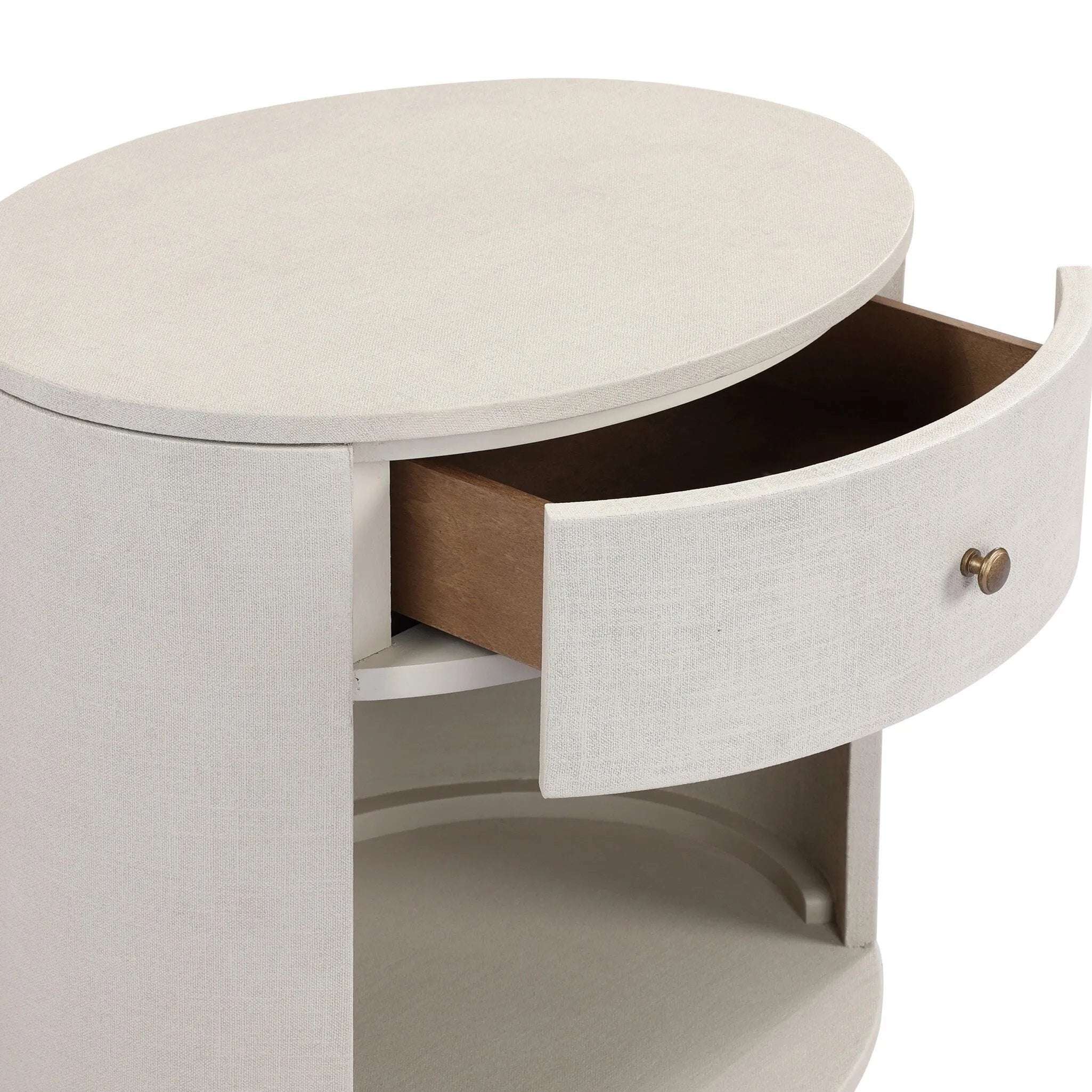 Uniquely made from ivory-painted linen, a beautifully curved nightstand shapes a single drawer and an open cubby for generous bedside storage Amethyst Home provides interior design, new home construction design consulting, vintage area rugs, and lighting in the Calabasas metro area.