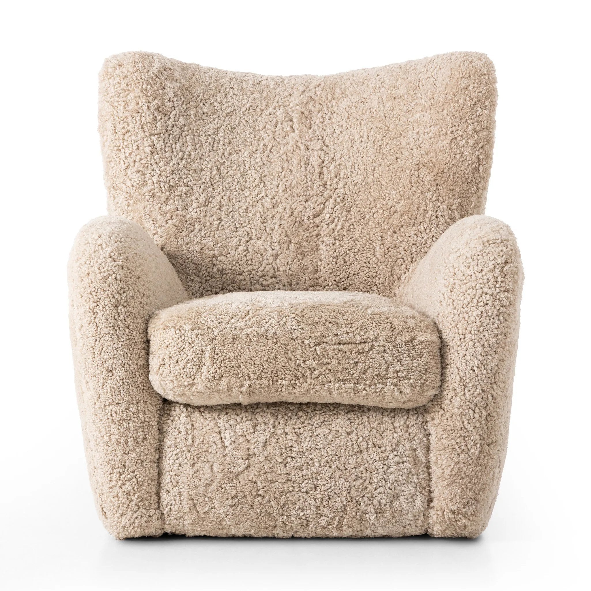 Relax into the curved arms and subtle wing back shape of this classic reading chair. Upholstered in an ethically sourced, natural beige shearling for extra comfort and texture. Crafted with S-spring suspension, a loose cushion and hidden legs beneath Amethyst Home provides interior design, new home construction design consulting, vintage area rugs, and lighting in the Austin metro area.