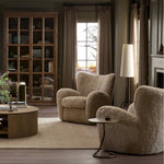 Relax into the curved arms and subtle wing back shape of this classic reading chair. Upholstered in an ethically sourced, natural beige shearling for extra comfort and texture. Crafted with S-spring suspension, a loose cushion and hidden legs beneath Amethyst Home provides interior design, new home construction design consulting, vintage area rugs, and lighting in the Calabasas metro area.