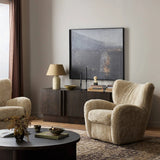 Relax into the curved arms and subtle wing back shape of this classic reading chair. Upholstered in an ethically sourced, natural beige shearling for extra comfort and texture. Crafted with S-spring suspension, a loose cushion and hidden legs beneath Amethyst Home provides interior design, new home construction design consulting, vintage area rugs, and lighting in the Portland metro area.