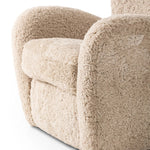 Relax into the curved arms and subtle wing back shape of this classic reading chair. Upholstered in an ethically sourced, natural beige shearling for extra comfort and texture. Crafted with S-spring suspension, a loose cushion and hidden legs beneath Amethyst Home provides interior design, new home construction design consulting, vintage area rugs, and lighting in the Scottsdale metro area.