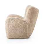 Relax into the curved arms and subtle wing back shape of this classic reading chair. Upholstered in an ethically sourced, natural beige shearling for extra comfort and texture. Crafted with S-spring suspension, a loose cushion and hidden legs beneath Amethyst Home provides interior design, new home construction design consulting, vintage area rugs, and lighting in the Washington metro area.