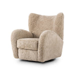 Relax into the curved arms and subtle wingback shape of this classic reading chair, featuring a reclining mechanism for ultimate comfort. Upholstered in an ethically sourced, natural beige shearling for extra comfort and texture. Crafted with S-spring suspension, a loose cushion and hidden legs beneath. Amethyst Home provides interior design, new home construction design consulting, vintage area rugs, and lighting in the Alpharetta metro area.