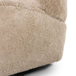 Relax into the curved arms and subtle wingback shape of this classic reading chair, featuring a reclining mechanism for ultimate comfort. Upholstered in an ethically sourced, natural beige shearling for extra comfort and texture. Crafted with S-spring suspension, a loose cushion and hidden legs beneath. Amethyst Home provides interior design, new home construction design consulting, vintage area rugs, and lighting in the Boston metro area.