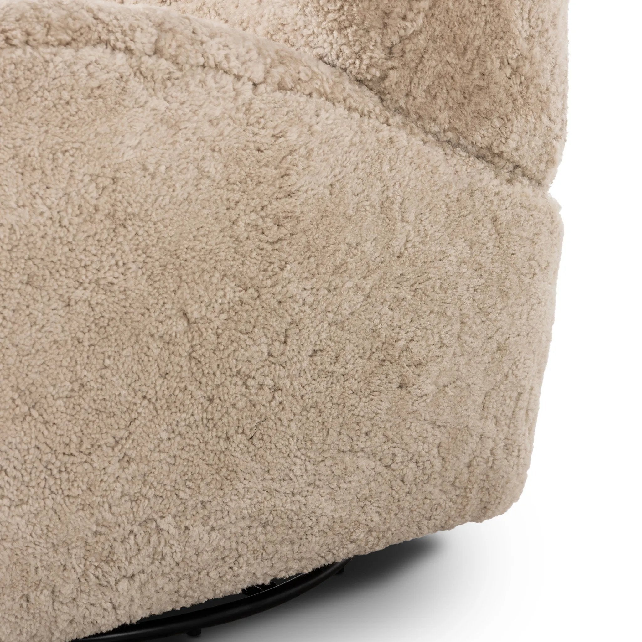 Relax into the curved arms and subtle wingback shape of this classic reading chair, featuring a reclining mechanism for ultimate comfort. Upholstered in an ethically sourced, natural beige shearling for extra comfort and texture. Crafted with S-spring suspension, a loose cushion and hidden legs beneath. Amethyst Home provides interior design, new home construction design consulting, vintage area rugs, and lighting in the Boston metro area.