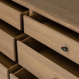 Crafted from sandy solid oak in a waterfall silhouette, this dresser adds a touch of contemporary simplicity to your bedroom. A bullnose edge and oval iron drawer pulls add variety.As lovers of natural design at Amethyst, we love the designer inspired Analisa 6 Drawer Dresser - Sandy Oak. Amethyst Home provides interior design, new home construction design consulting, vintage area rugs, and lighting in the Los Angeles metro area.