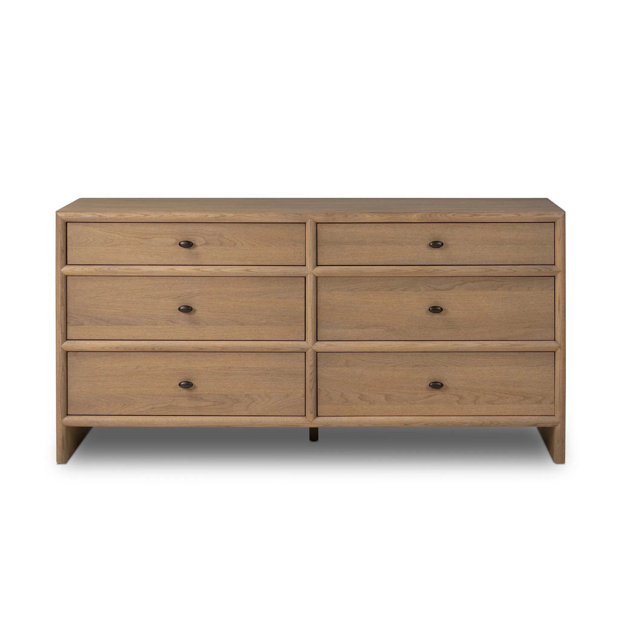 Crafted from sandy solid oak in a waterfall silhouette, this dresser adds a touch of contemporary simplicity to your bedroom. A bullnose edge and oval iron drawer pulls add variety.As lovers of natural design at Amethyst, we love the designer inspired Analisa 6 Drawer Dresser - Sandy Oak. Amethyst Home provides interior design, new home construction design consulting, vintage area rugs, and lighting in the Monterey metro area.