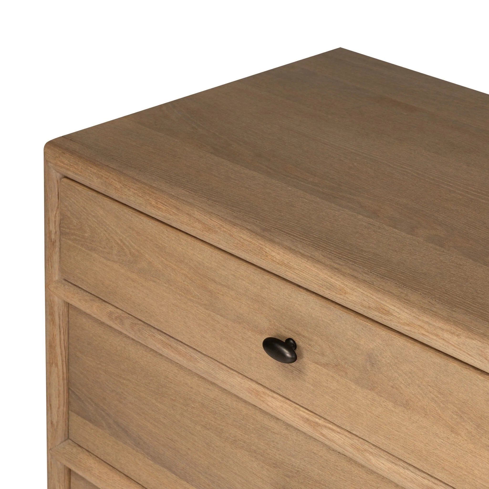 Crafted from sandy solid oak in a waterfall silhouette, this dresser adds a touch of contemporary simplicity to your bedroom. A bullnose edge and oval iron drawer pulls add variety.As lovers of natural design at Amethyst, we love the designer inspired Analisa 6 Drawer Dresser - Sandy Oak. Amethyst Home provides interior design, new home construction design consulting, vintage area rugs, and lighting in the Seattle metro area.