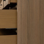 Crafted from sandy solid oak in a waterfall silhouette, this storage-driven dresser adds a touch of contemporary simplicity to your bedroom. A bullnose edge and oval iron drawer pulls add variety.As enthusiasts of modern design at Amethyst, we love the designer inspired Analisa 9 Drawer Dresser - Sandy Oak. Amethyst Home provides interior design, new home construction design consulting, vintage area rugs, and lighting in the Charlotte metro area.