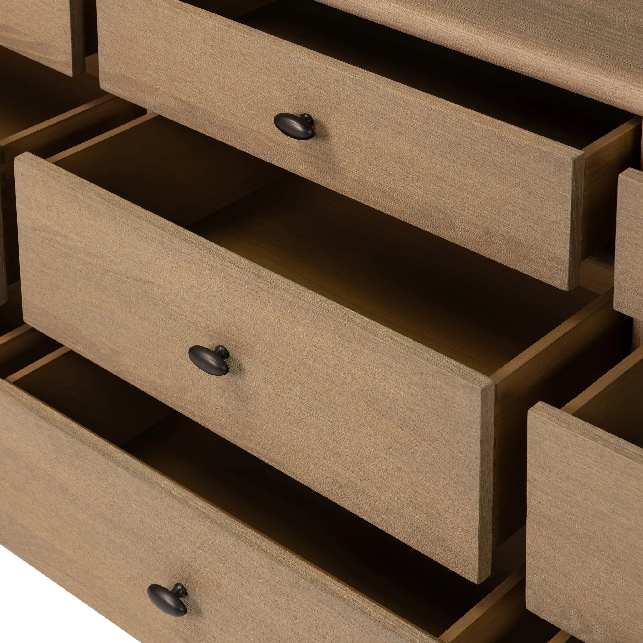 Crafted from sandy solid oak in a waterfall silhouette, this storage-driven dresser adds a touch of contemporary simplicity to your bedroom. A bullnose edge and oval iron drawer pulls add variety.As enthusiasts of modern design at Amethyst, we love the designer inspired Analisa 9 Drawer Dresser - Sandy Oak. Amethyst Home provides interior design, new home construction design consulting, vintage area rugs, and lighting in the Park City metro area.