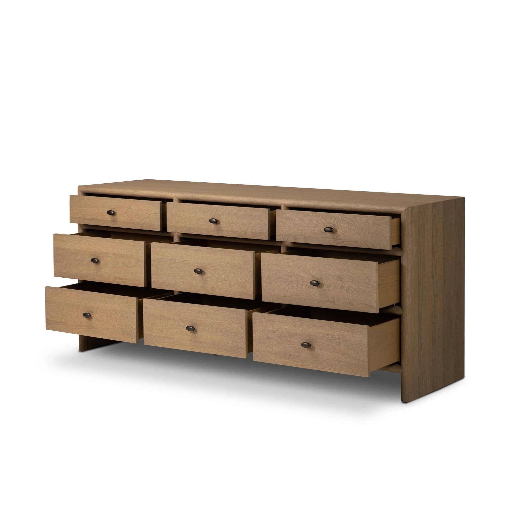 Crafted from sandy solid oak in a waterfall silhouette, this storage-driven dresser adds a touch of contemporary simplicity to your bedroom. A bullnose edge and oval iron drawer pulls add variety.As enthusiasts of modern design at Amethyst, we love the designer inspired Analisa 9 Drawer Dresser - Sandy Oak. Amethyst Home provides interior design, new home construction design consulting, vintage area rugs, and lighting in the Tampa metro area.