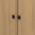 Crafted from sandy solid oak in a waterfall silhouette, this armoire adds a touch of contemporary simplicity to your bedroom. Double doors open to spacious shelving, complemented by a bottom drawer for extra storage. The piece’s bullnose edge and oval iron hardware add variety. Amethyst Home provides interior design, new home construction design consulting, vintage area rugs, and lighting in the Seattle metro area.
