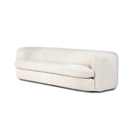 Featuring Clarissa Sofa by Four Hands at Amethyst Home. Organic curves with a dreamy French inspired boucle fabric -- the Clarissa sofa is an Amethyst favorite.  The sleek single seat cushion with firm back provides luxe comfort.
Overall Dimensions: 95.00"w x 37.50"d x 27.50"hWeight : 131.39 lbMaterials : 47% Polyester, 18% Viscose, 30% Acrylic, 5% Linen, So. Amethyst Home provides interior design, new home construction design consulting, vintage area rugs, and lighting in the Portland metro area.