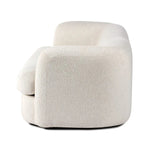 Featuring Clarissa Sofa by Four Hands at Amethyst Home. Organic curves with a dreamy French inspired boucle fabric -- the Clarissa sofa is an Amethyst favorite.  The sleek single seat cushion with firm back provides luxe comfort.
Overall Dimensions: 95.00"w x 37.50"d x 27.50"hWeight : 131.39 lbMaterials : 47% Polyester, 18% Viscose, 30% Acrylic, 5% Line. Amethyst Home provides interior design, new home construction design consulting, vintage area rugs, and lighting in the Winter Garden metro area.