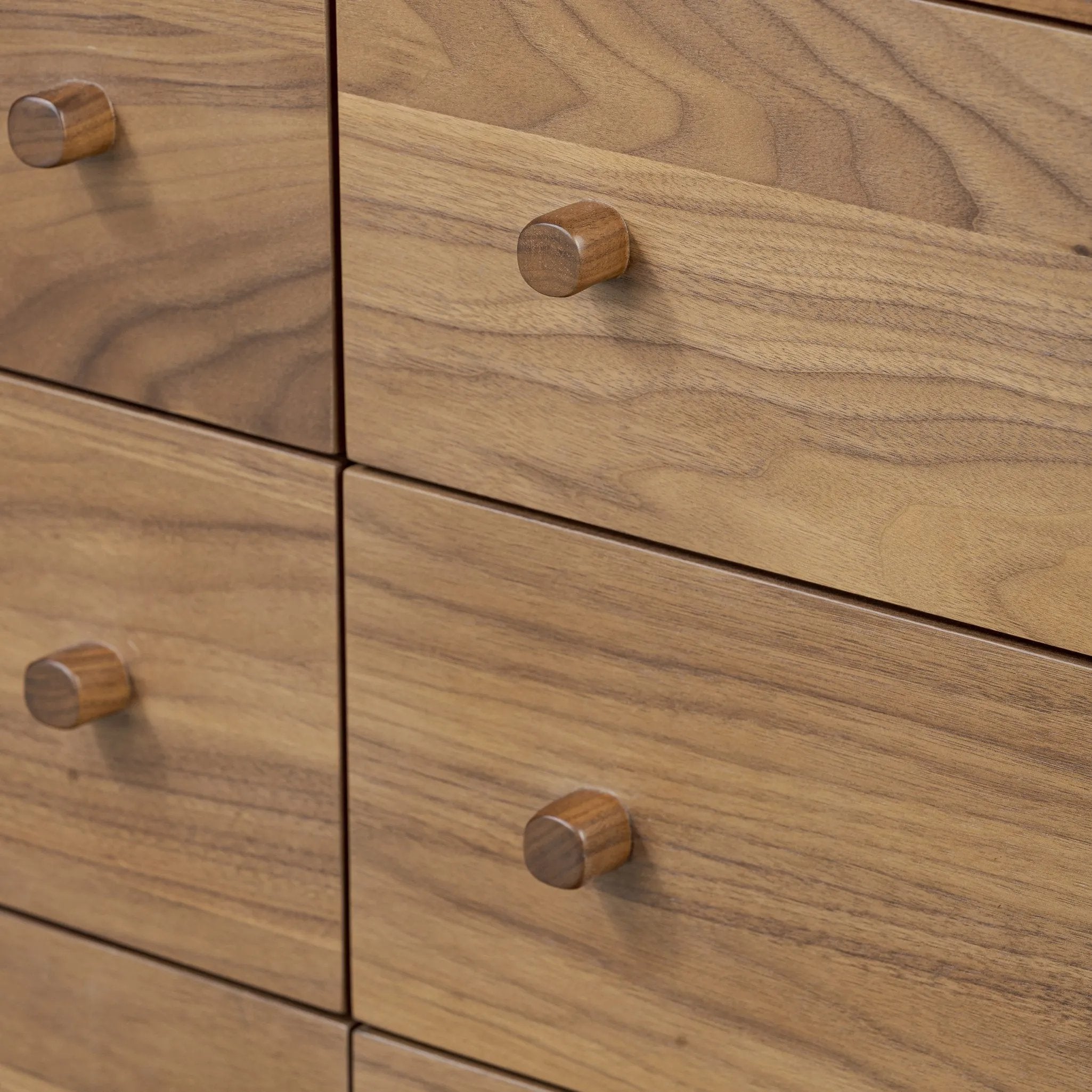 Featuring Arturo Natural Walnut Veneer 9 Drawer Dresser by Four Hands at Amethyst Home. Inspired by campaign-style furniture of the 1800s — packable pieces first designed for traveling military use — a simply shaped dresser of natural walnut features a subtly inset top and rounded legs, finished with wooden hardware. This item has been modified to comply with t. Amethyst Home provides interior design, new home construction design consulting, vintage area rugs, and lighting in the Miami metro area.