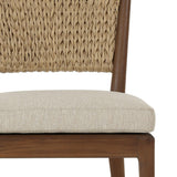 A fresh take on the traditional woven style, this outdoor dining chair features a faux banana leaf material wrapped in a bold, chunky texture around FSC®-certified teak framing. Cover or store indoors during inclement weather and when not in use. Amethyst Home provides interior design, new home construction design consulting, vintage area rugs, and lighting in the Laguna Beach metro area.