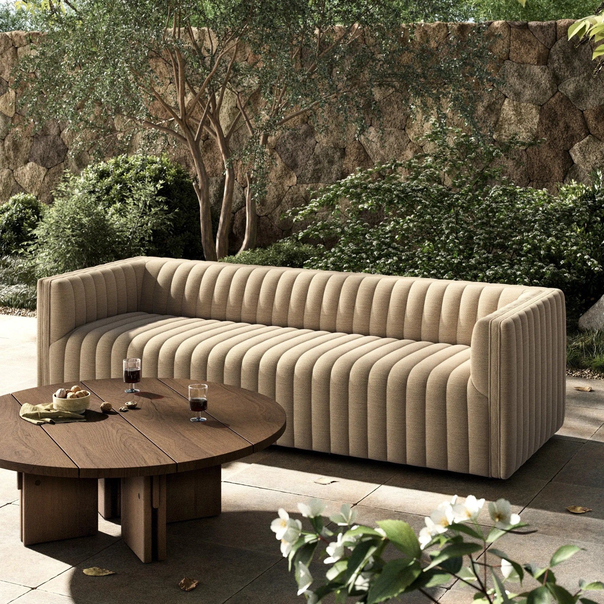 A dramatically channeled outdoor sofa with subtly textured upholstery for a clean, inviting look. Cover or store indoors during inclement weather and when not in use Amethyst Home provides interior design, new home construction design consulting, vintage area rugs, and lighting in the Washington metro area.