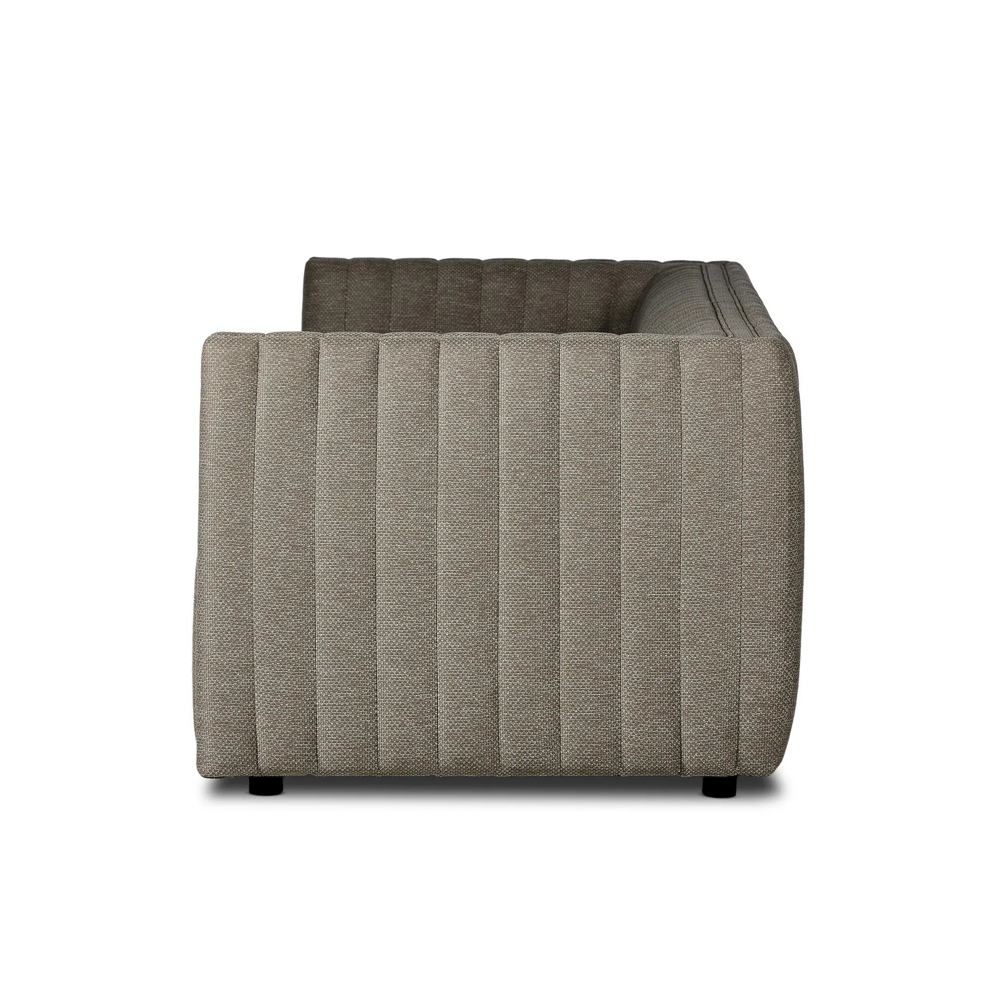 Featuring Augustine Casa Grey Outdoor Sofa-97" by Four Hands at Amethyst Home. A dramatically channeled outdoor sofa with subtly textured upholstery for a clean, inviting look. Cover or store indoors during inclement weather and when not in use.Overall Dimensions: 95.75"w x 35.50"d x 26.75"hWeight : 108.25 lbsMaterials: 100% Olefin, Aluminum, 91% Polyureth. Amethyst Home provides interior design, new home construction design consulting, vintage area rugs, and lighting in the Alpharetta metro area.