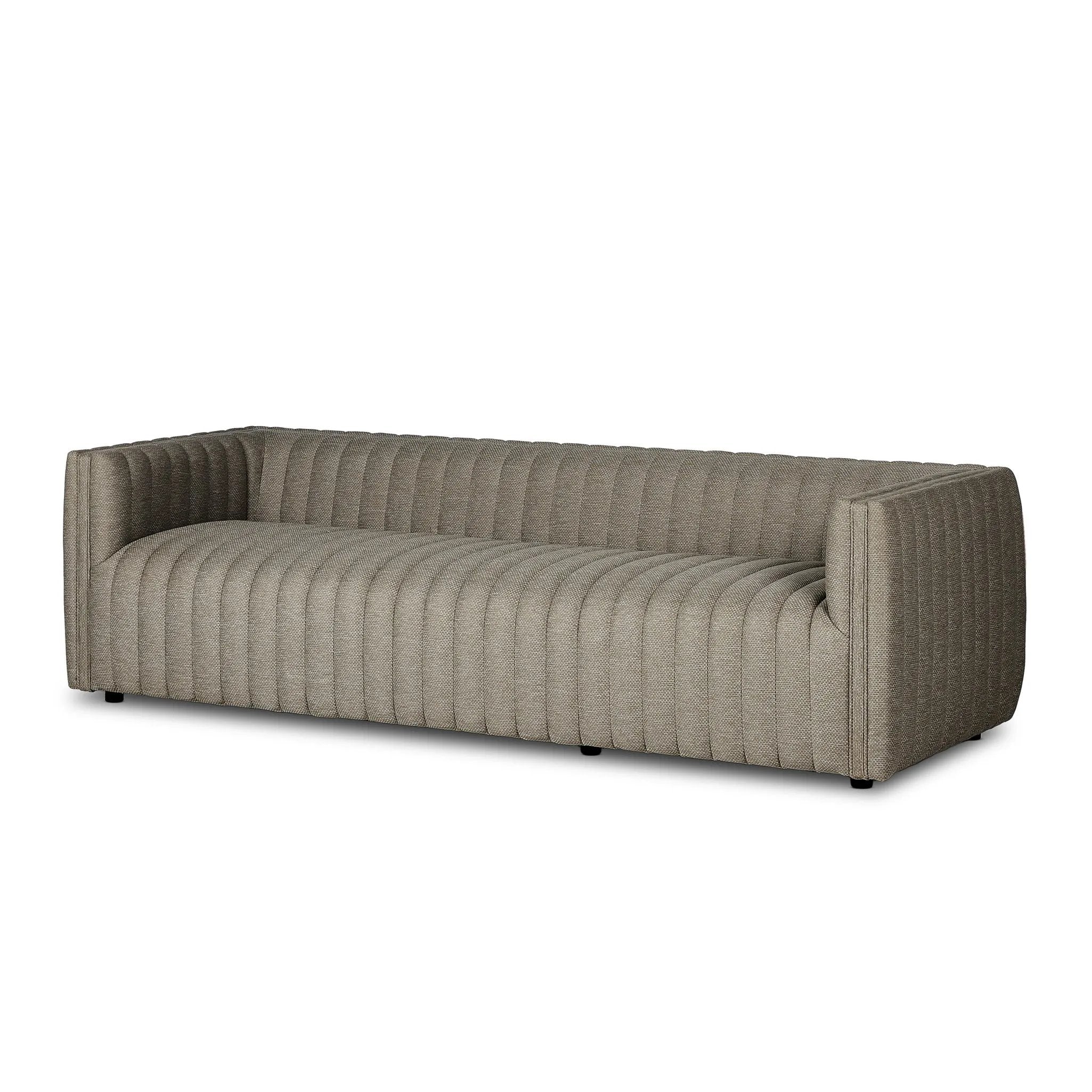 A dramatically channeled outdoor sofa with subtly textured upholstery for a clean, inviting look. Cover or store indoors during inclement weather and when not in use Amethyst Home provides interior design, new home construction design consulting, vintage area rugs, and lighting in the Newport Beach metro area.