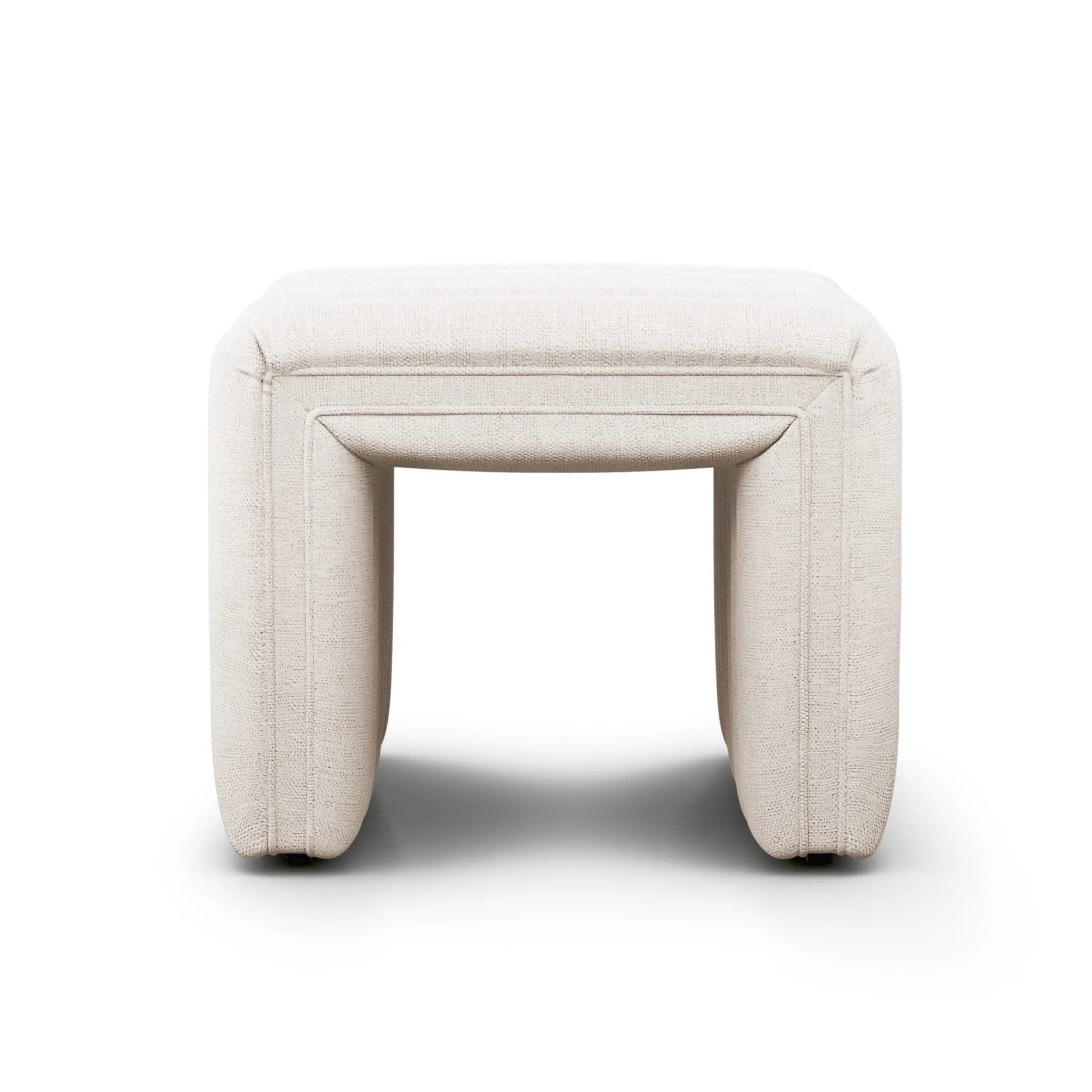 Layer in an extra surface or added seating by way of a linen-blend ottoman in a crisp, clean off-white, with dramatic channeling for great texture Amethyst Home provides interior design, new home construction design consulting, vintage area rugs, and lighting in the Dallas metro area.