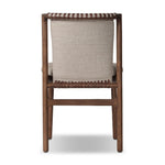 Midcentury-inspired with its minimalist wooden frame, this armless dining chair features a low back and float-like upholstered seat Amethyst Home provides interior design, new home construction design consulting, vintage area rugs, and lighting in the Austin metro area.