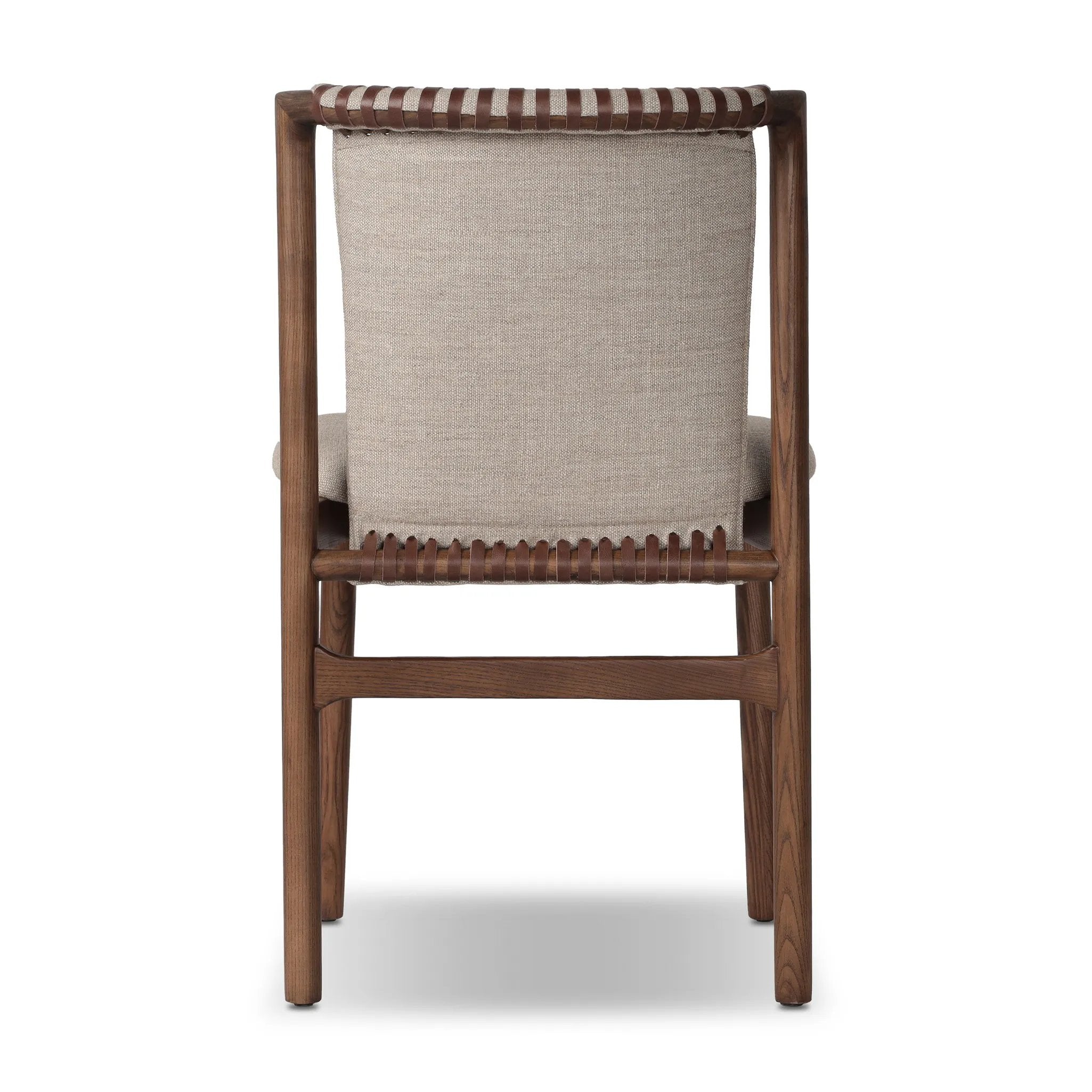 Midcentury-inspired with its minimalist wooden frame, this armless dining chair features a low back and float-like upholstered seat Amethyst Home provides interior design, new home construction design consulting, vintage area rugs, and lighting in the Austin metro area.