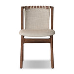 Midcentury-inspired with its minimalist wooden frame, this armless dining chair features a low back and float-like upholstered seat Amethyst Home provides interior design, new home construction design consulting, vintage area rugs, and lighting in the Charlotte metro area.