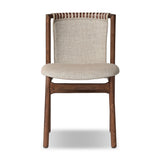 Midcentury-inspired with its minimalist wooden frame, this armless dining chair features a low back and float-like upholstered seat Amethyst Home provides interior design, new home construction design consulting, vintage area rugs, and lighting in the Charlotte metro area.