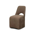 An armless dining chair fully upholstered in an inviting neutral coffee color, with a beautifully curved silhouette and arch-style cutout where the seat meets the back, creating a lightened sense of softness.As enthusiasts of modern design at Amethyst, we love the designer inspired Barclay Dining Chair - Laughlin Cafe. Amethyst Home provides interior design, new home construction design consulting, vintage area rugs, and lighting in the Boston metro area.