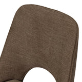 An armless dining chair fully upholstered in an inviting neutral coffee color, with a beautifully curved silhouette and arch-style cutout where the seat meets the back, creating a lightened sense of softness.As enthusiasts of modern design at Amethyst, we love the designer inspired Barclay Dining Chair - Laughlin Cafe. Amethyst Home provides interior design, new home construction design consulting, vintage area rugs, and lighting in the Calabasas metro area.