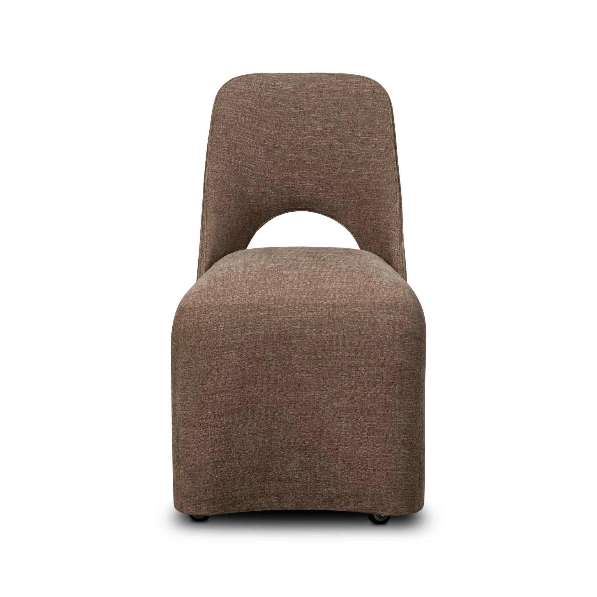 An armless dining chair fully upholstered in an inviting neutral coffee color, with a beautifully curved silhouette and arch-style cutout where the seat meets the back, creating a lightened sense of softness.As enthusiasts of modern design at Amethyst, we love the designer inspired Barclay Dining Chair - Laughlin Cafe. Amethyst Home provides interior design, new home construction design consulting, vintage area rugs, and lighting in the Portland metro area.