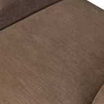 A 360 swivel chair fully upholstered in an inviting neutral coffee color, with a beautifully curved silhouette and arch-style cutout where the seat meets the back, creating a lightened sense of softness.As lovers of clean style at Amethyst, we love the nature inspired Barclay Swivel Chair - Laughlin Cafe. Amethyst Home provides interior design, new home construction design consulting, vintage area rugs, and lighting in the Calabasas metro area.
