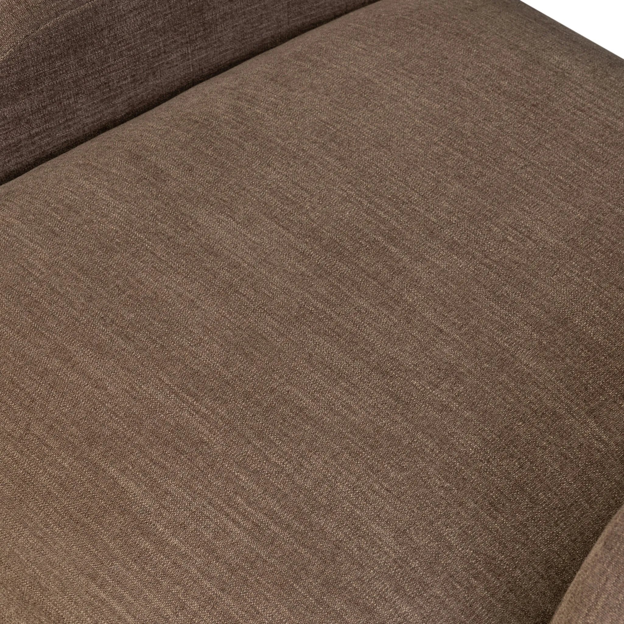 A 360 swivel chair fully upholstered in an inviting neutral coffee color, with a beautifully curved silhouette and arch-style cutout where the seat meets the back, creating a lightened sense of softness.As lovers of clean style at Amethyst, we love the nature inspired Barclay Swivel Chair - Laughlin Cafe. Amethyst Home provides interior design, new home construction design consulting, vintage area rugs, and lighting in the Calabasas metro area.
