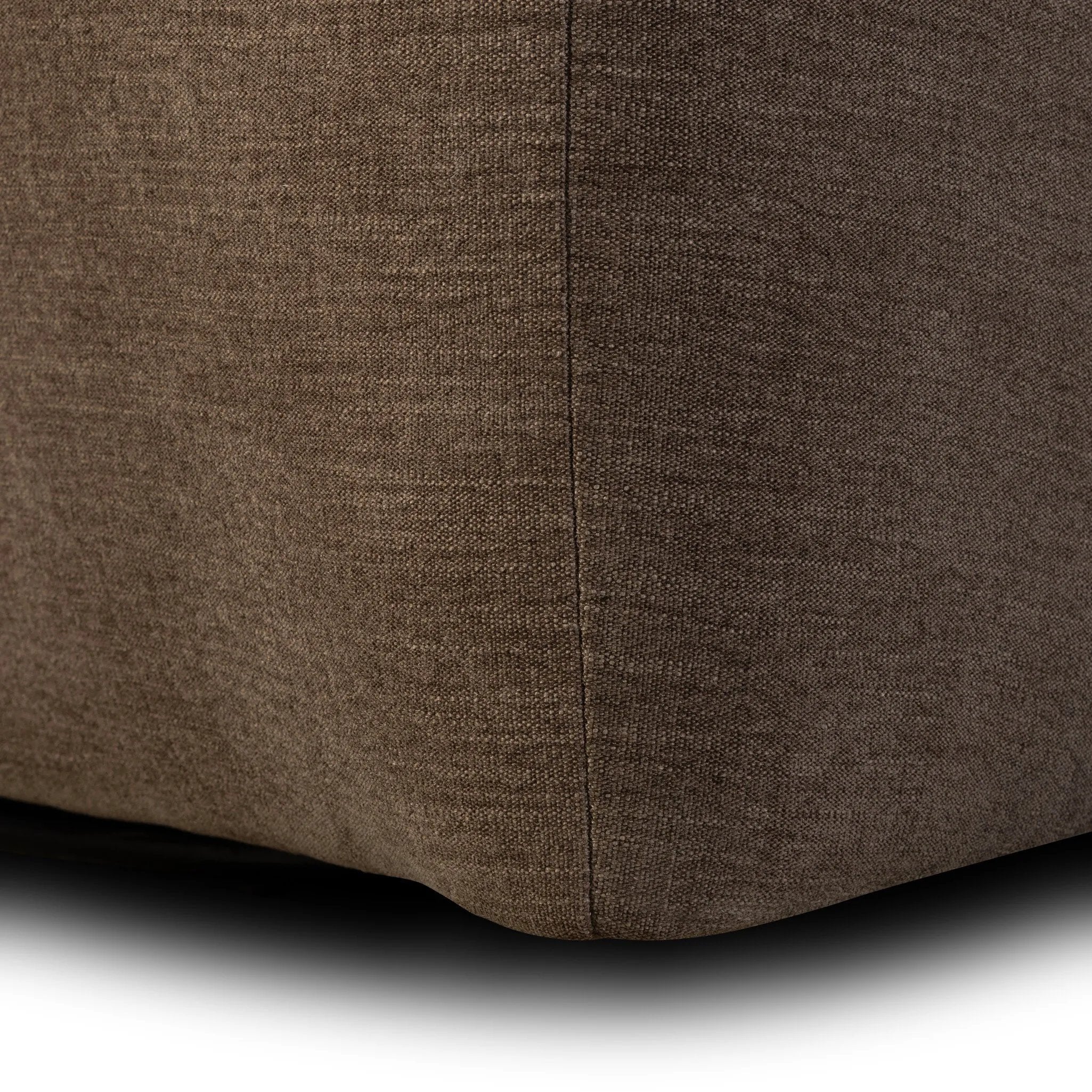 A 360 swivel chair fully upholstered in an inviting neutral coffee color, with a beautifully curved silhouette and arch-style cutout where the seat meets the back, creating a lightened sense of softness.As lovers of clean style at Amethyst, we love the nature inspired Barclay Swivel Chair - Laughlin Cafe. Amethyst Home provides interior design, new home construction design consulting, vintage area rugs, and lighting in the Dallas metro area.