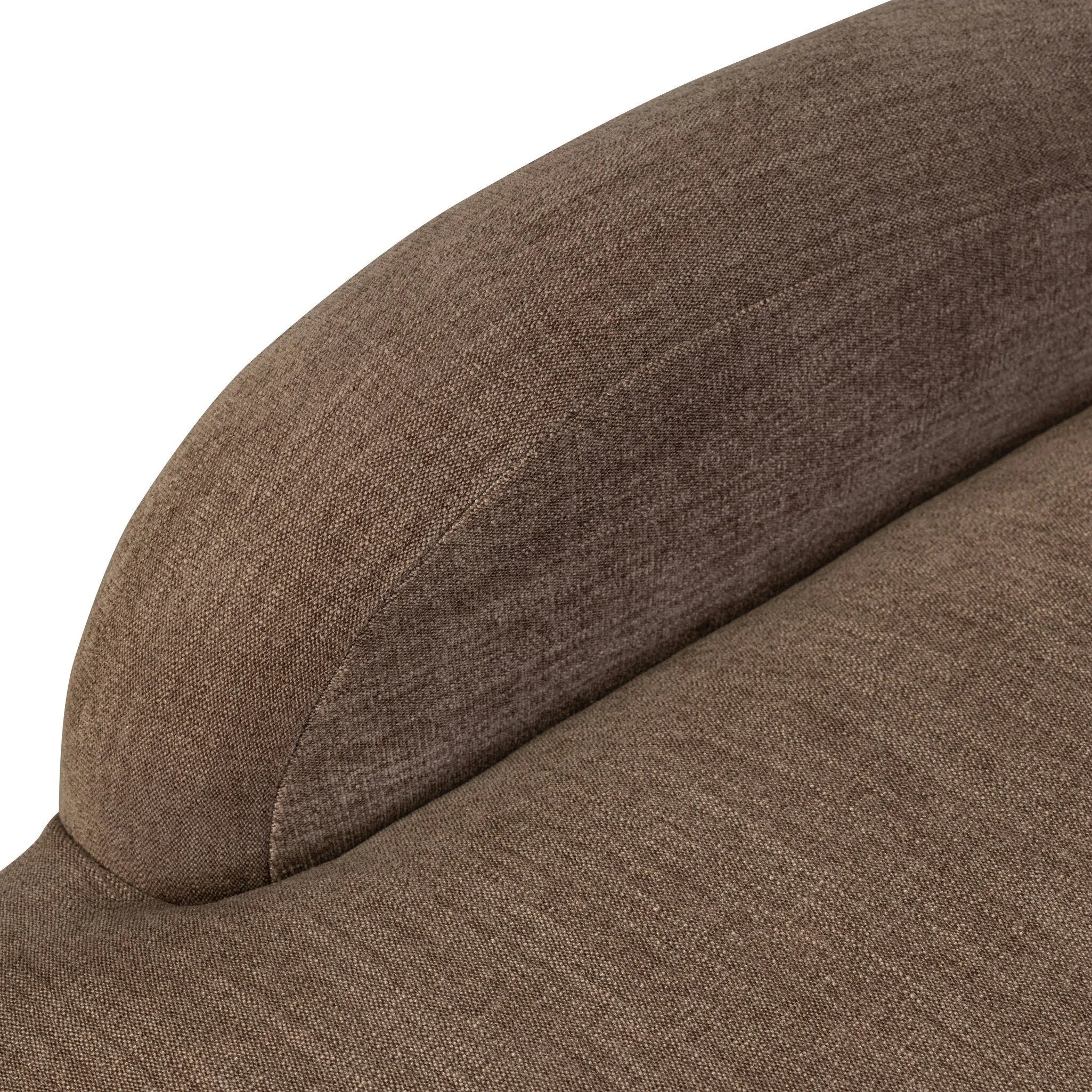 A 360 swivel chair fully upholstered in an inviting neutral coffee color, with a beautifully curved silhouette and arch-style cutout where the seat meets the back, creating a lightened sense of softness.As lovers of clean style at Amethyst, we love the nature inspired Barclay Swivel Chair - Laughlin Cafe. Amethyst Home provides interior design, new home construction design consulting, vintage area rugs, and lighting in the Newport Beach metro area.