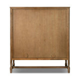 A classically constructed cabinet meets a clever storage solution. Two sets of large, flat-paneled doors conceal spacious shelves. Subtle hardware accents weathered oak. A design collaboration by Amber Lewis and Four Hands. This item has limited online distribution and may not be sold on websites without prior approval. Amethyst Home provides interior design, new home construction design consulting, vintage area rugs, and lighting in the Calabasas metro area.