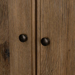 A classically constructed cabinet meets a clever storage solution. Two sets of large, flat-paneled doors conceal spacious shelves. Subtle hardware accents weathered oak. A design collaboration by Amber Lewis and Four Hands. This item has limited online distribution and may not be sold on websites without prior approval. Amethyst Home provides interior design, new home construction design consulting, vintage area rugs, and lighting in the Charlotte metro area.