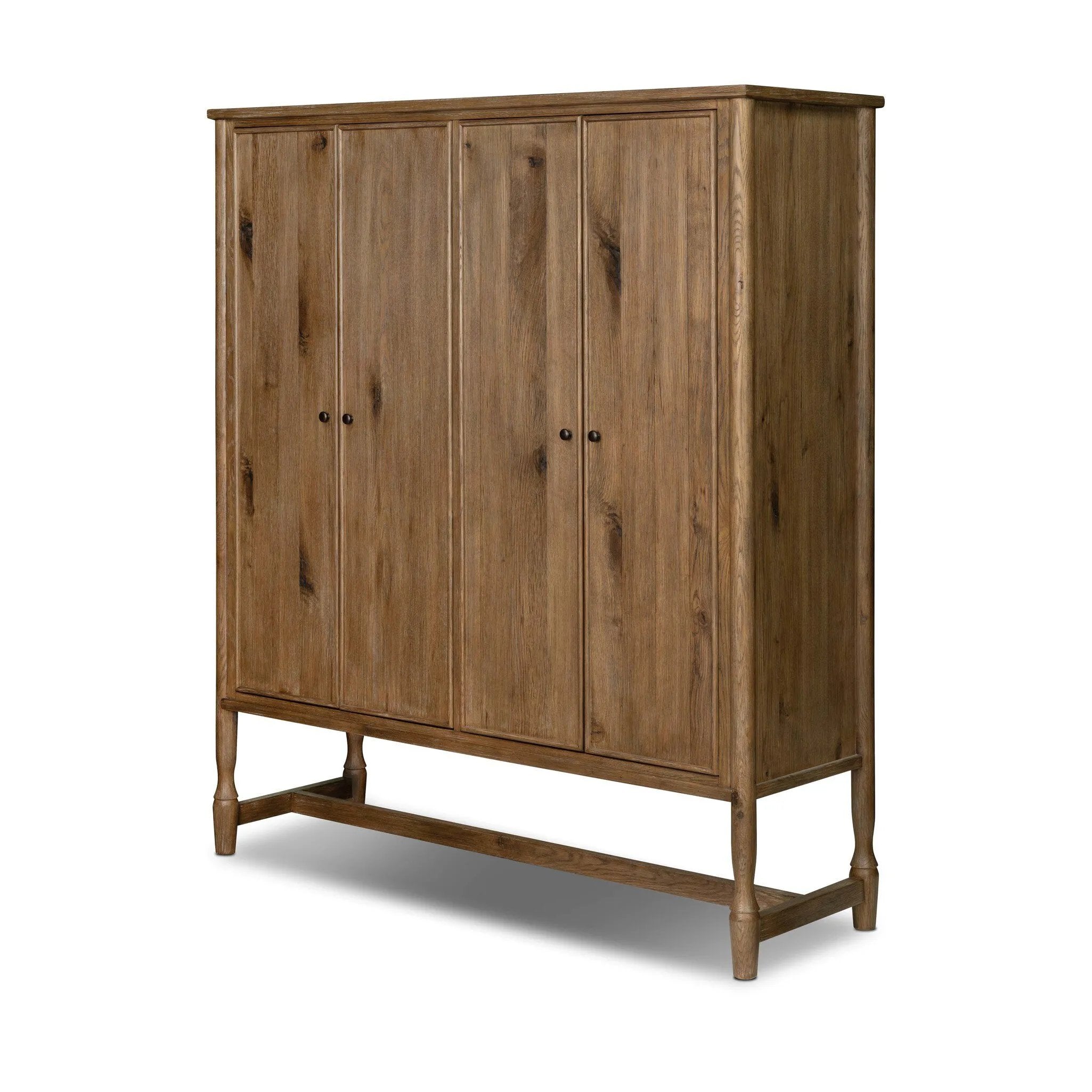A classically constructed cabinet meets a clever storage solution. Two sets of large, flat-paneled doors conceal spacious shelves. Subtle hardware accents weathered oak. A design collaboration by Amber Lewis and Four Hands. This item has limited online distribution and may not be sold on websites without prior approval. Amethyst Home provides interior design, new home construction design consulting, vintage area rugs, and lighting in the Kansas City metro area.