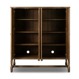 A classically constructed cabinet meets a clever storage solution. Two sets of large, flat-paneled doors conceal spacious shelves. Subtle hardware accents weathered oak. A design collaboration by Amber Lewis and Four Hands. This item has limited online distribution and may not be sold on websites without prior approval. Amethyst Home provides interior design, new home construction design consulting, vintage area rugs, and lighting in the Nashville metro area.