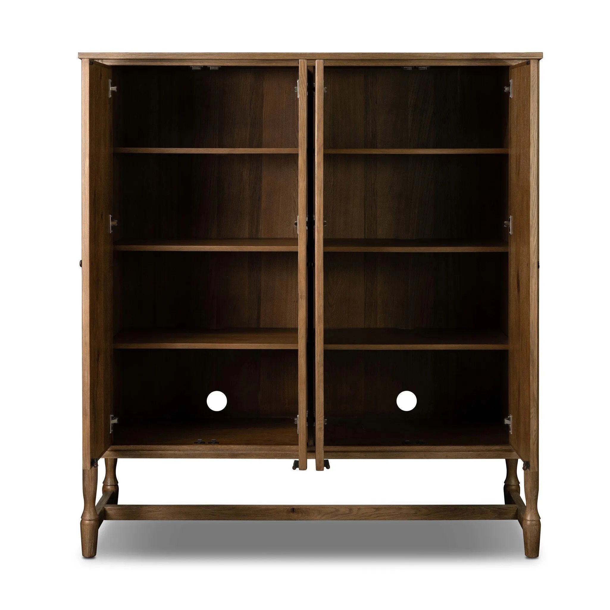 A classically constructed cabinet meets a clever storage solution. Two sets of large, flat-paneled doors conceal spacious shelves. Subtle hardware accents weathered oak. A design collaboration by Amber Lewis and Four Hands. This item has limited online distribution and may not be sold on websites without prior approval. Amethyst Home provides interior design, new home construction design consulting, vintage area rugs, and lighting in the Nashville metro area.