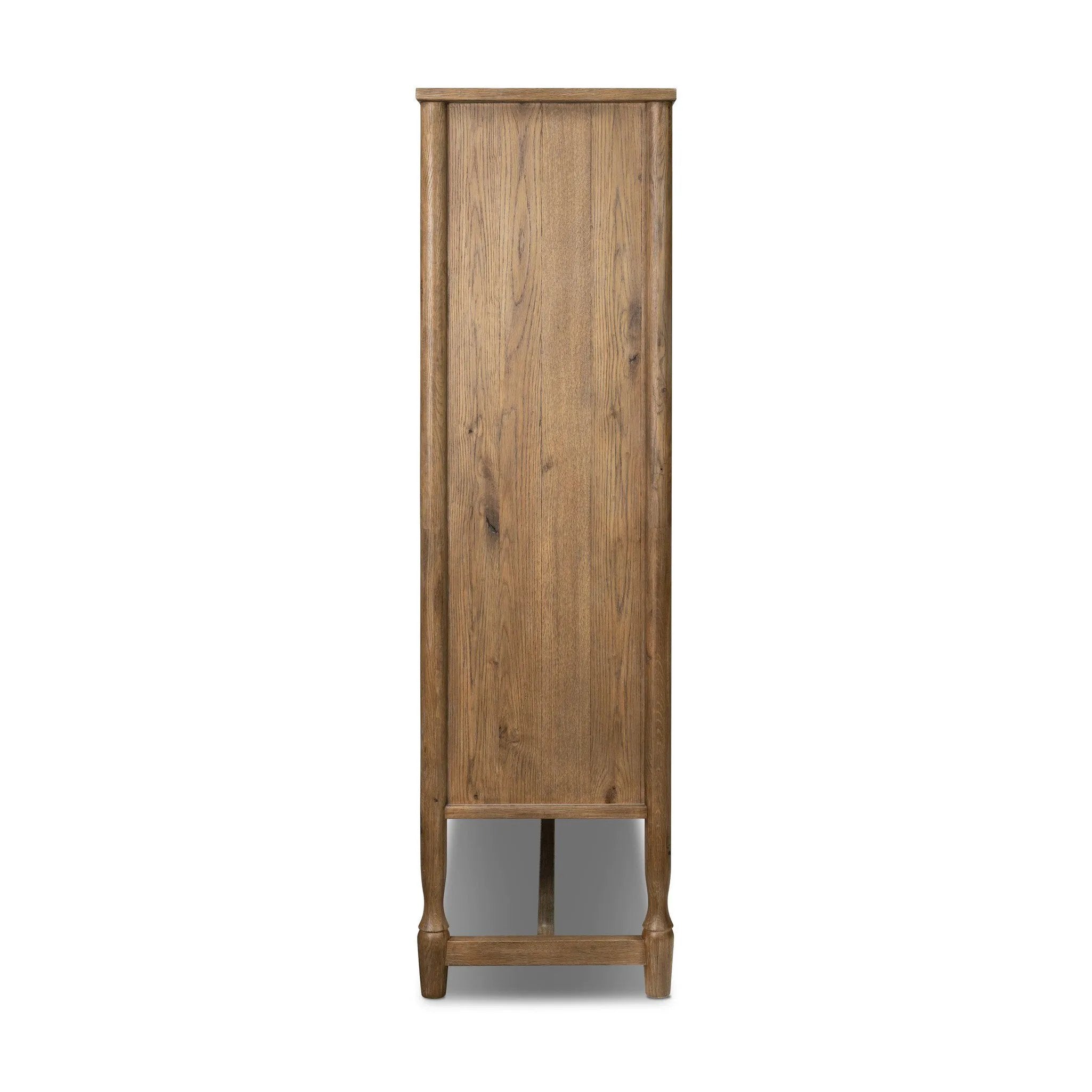 A classically constructed cabinet meets a clever storage solution. Two sets of large, flat-paneled doors conceal spacious shelves. Subtle hardware accents weathered oak. A design collaboration by Amber Lewis and Four Hands. This item has limited online distribution and may not be sold on websites without prior approval. Amethyst Home provides interior design, new home construction design consulting, vintage area rugs, and lighting in the Seattle metro area.
